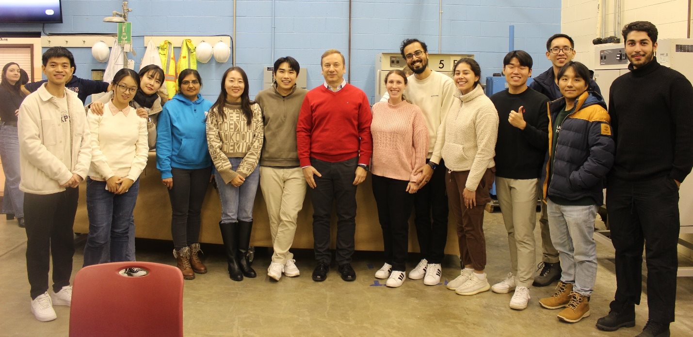 A group of people posing for a photoAI-generated content may be incorrect.