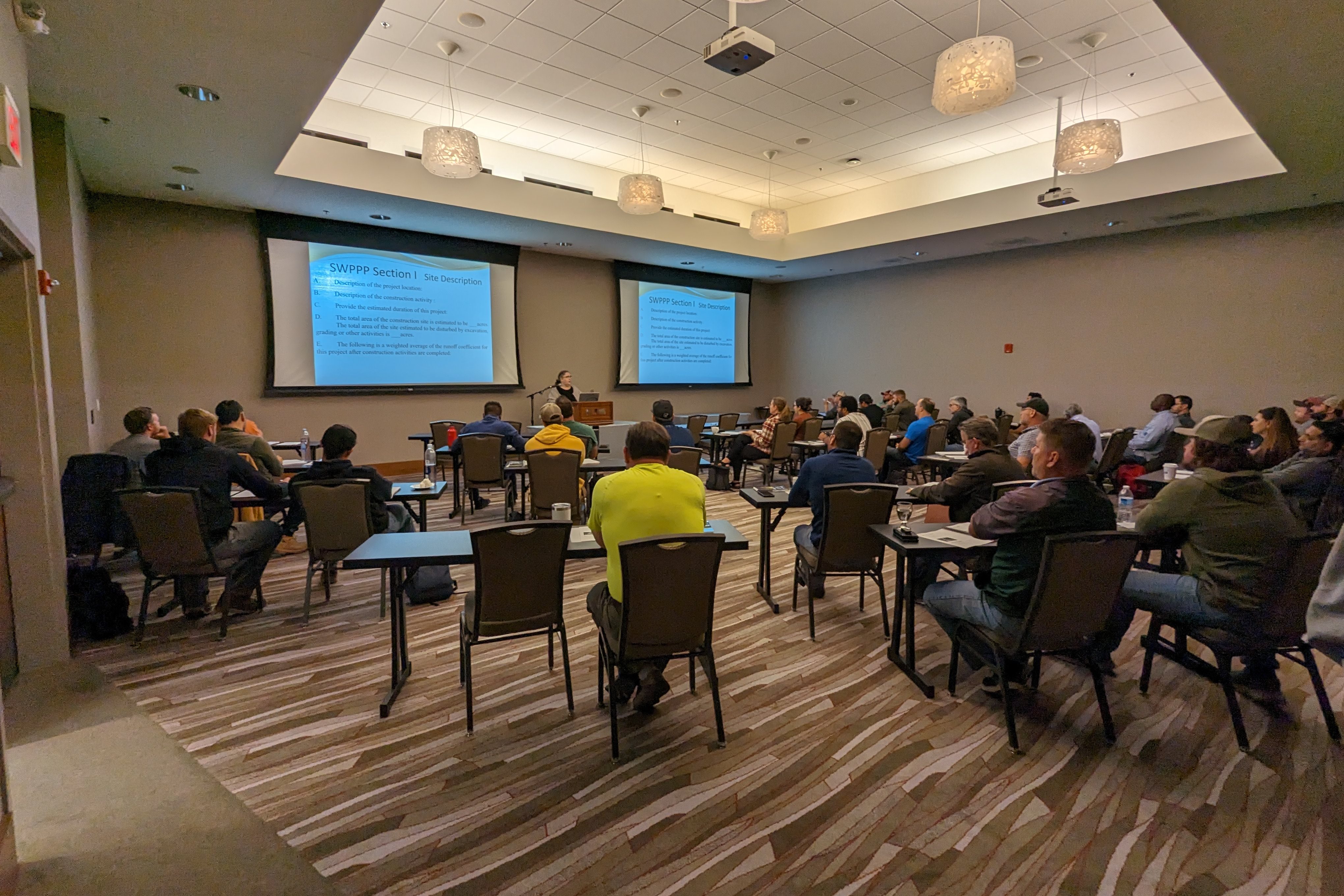 A room full of people attending an ICT certification workshop at the I Hotel in Champaign, Illinois.
