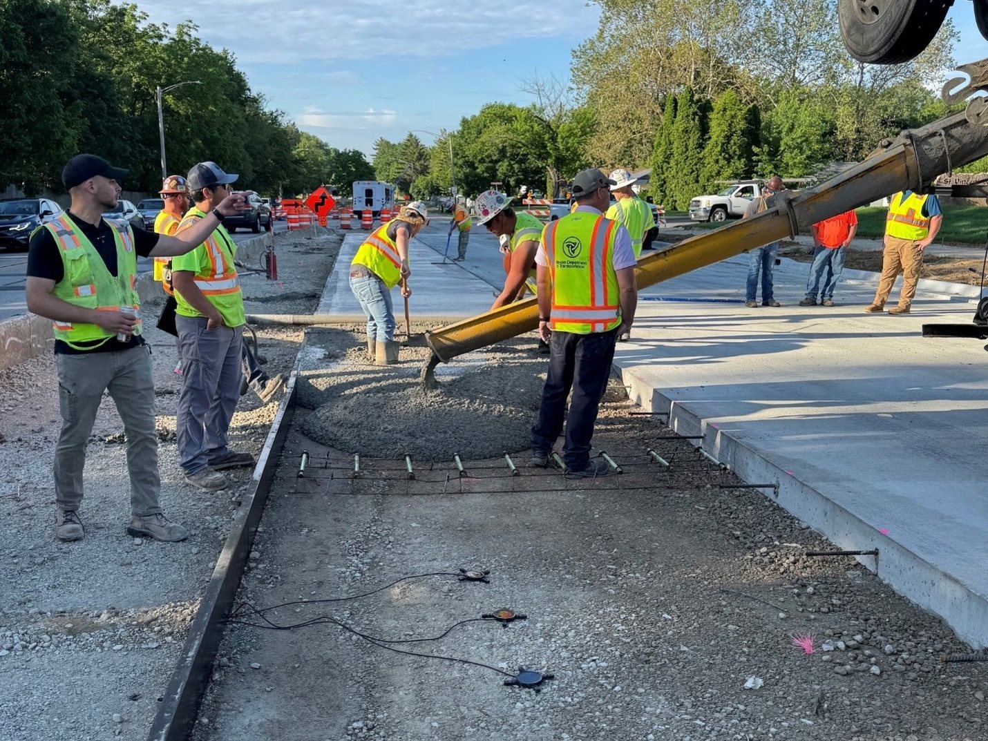 Photo credit: Charles Wienrank. REBEL sensor installation (foreground) on N. University Street paving project in Peoria.