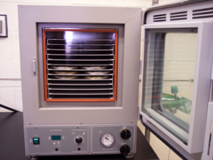 The accelerated aging of bituminous sealant and fillers with a vacuum oven.