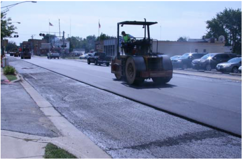 Roller compaction and milled parking area with filled joint/crack.