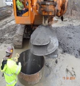 Construction of a drilled shaft at an IDOT bridge site.