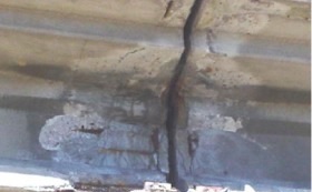 Damage in the end region of an American Association of State Highway and Transportation bridge girder.