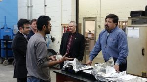 Students, researchers, and engineers give Richard Snider a tour of ATREL.