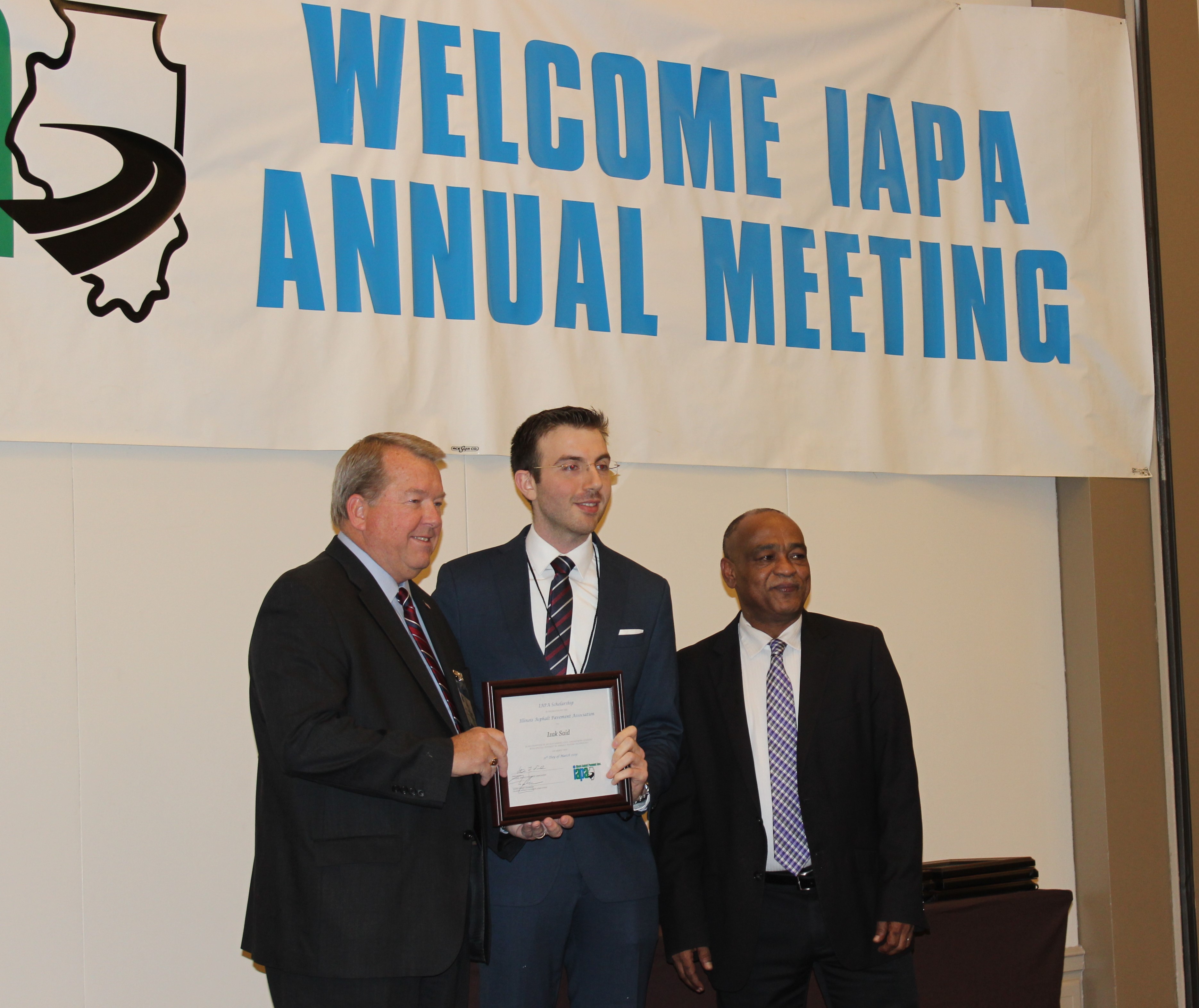 UIUC doctoral candidate Izak Said, center, couldn&rsquo;t help but grin posing for a photo with Sen. Donald DeWitte (R-St. Charles), left, and Illinois Department of Transportation Secretary Omer Osman.