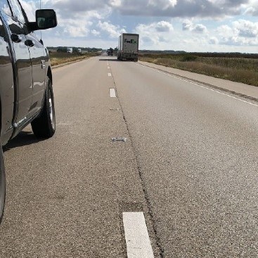 Vehicles pass by all-weather markings along I-80 near Princeton, Illinois earlier in September 2018.