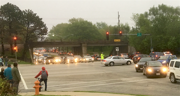 Traffic backs up along Neil Street following an event at Champaign&rsquo;s State Farm Center during testing of a real-time adaptive traffic control system.