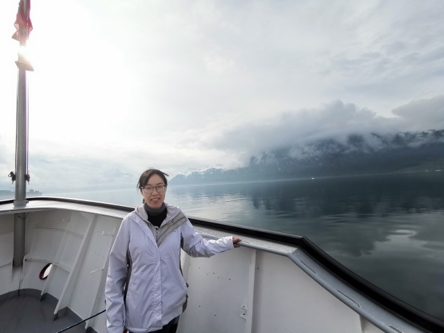 UIUC doctoral student Yi Li poses for a photo aboard a boat on Lake Lucerne in Switzerland earlier this summer.