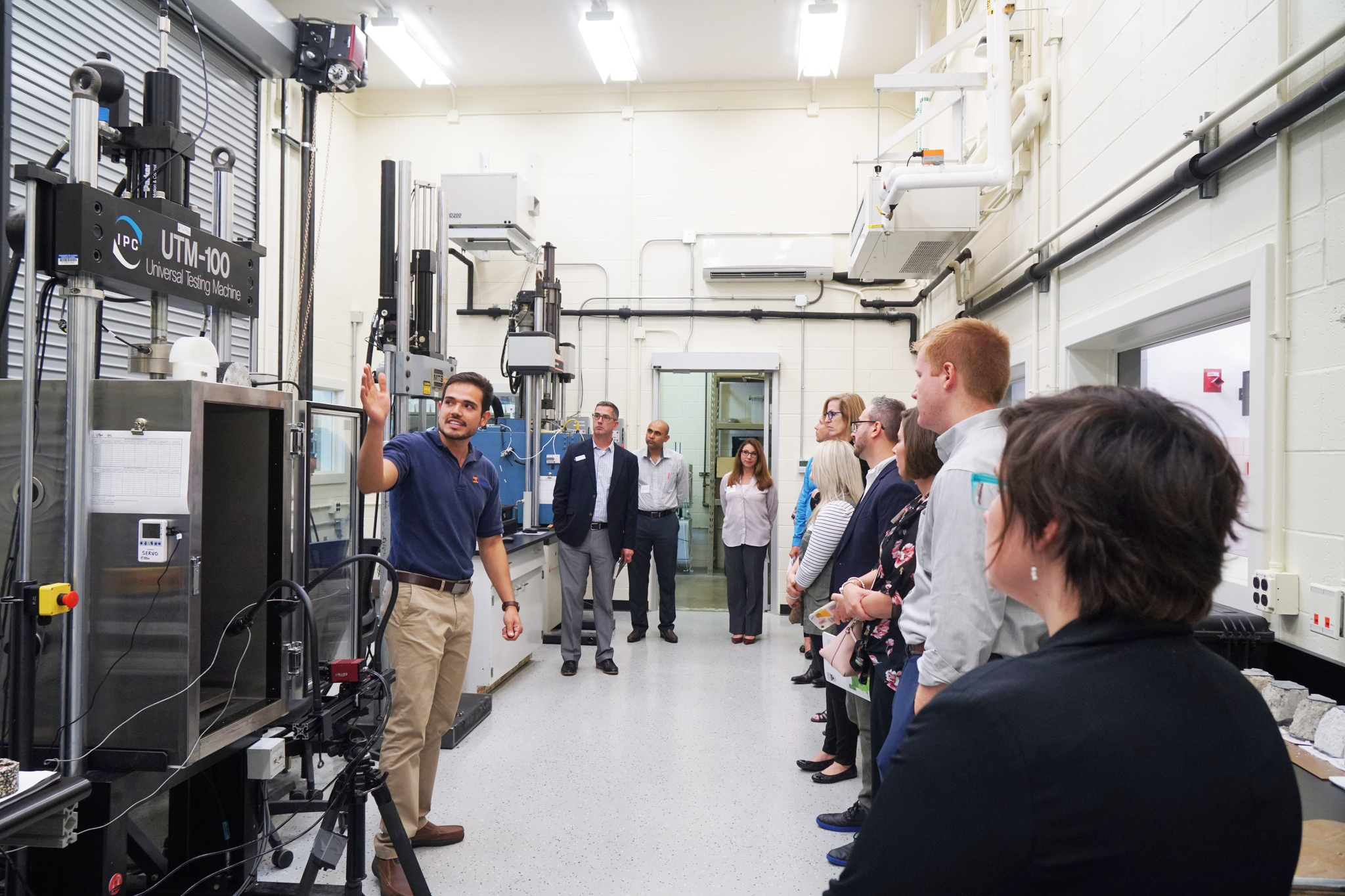 UIUC doctoral student Jose Rivera-Perez, left, shows members of the Champaign County Economic Development Corporation all of the leading transportation research ICT accomplishes thanks to its premier facility in Rantoul earlier on Sept. 23.