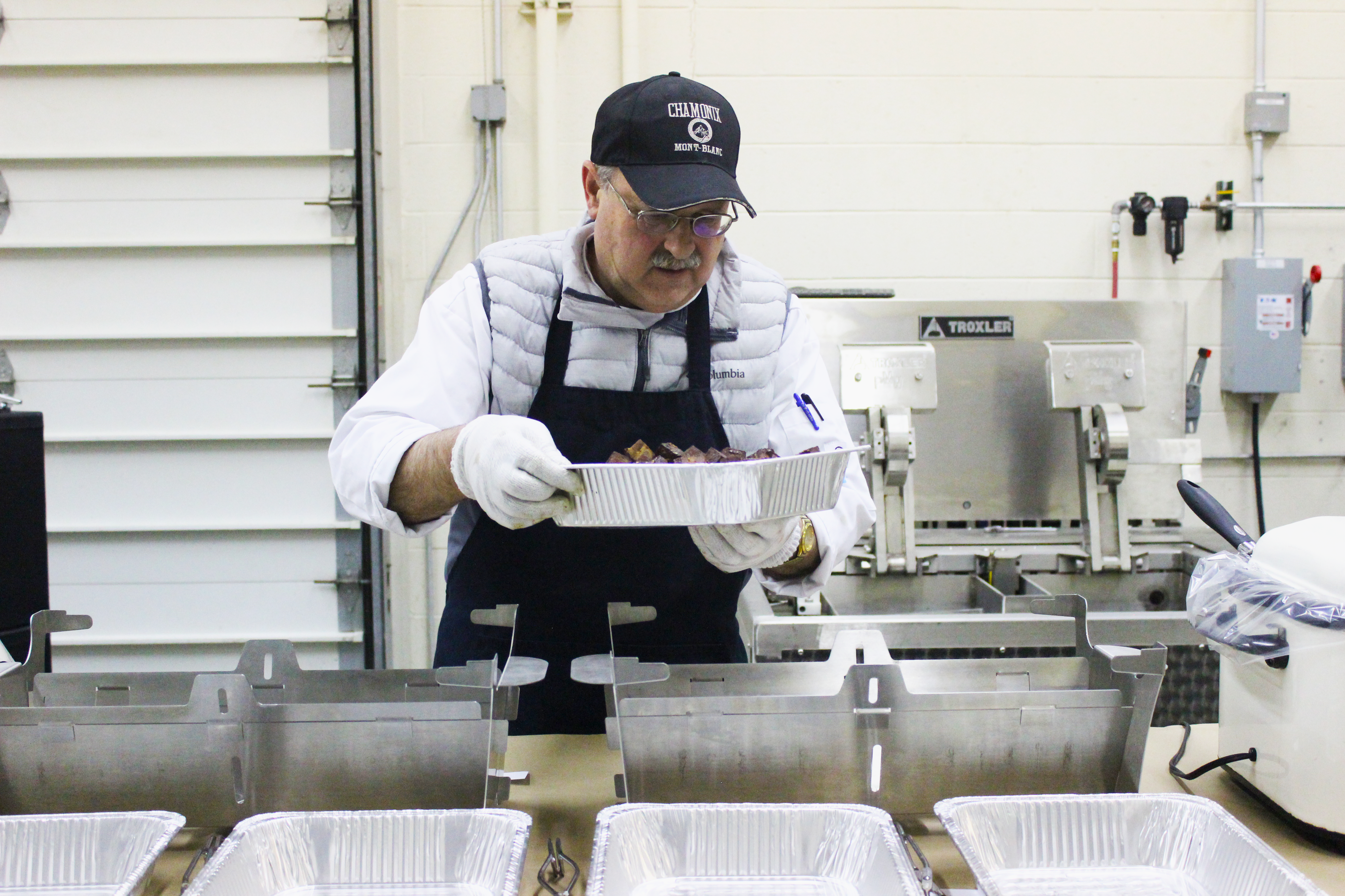 David Lippert stokes his love of barbecue in preparing the Winter Open House feast at ICT in Rantoul, Ill. earlier on Dec. 3, 2019. His efforts always put a big smile on the thankful crowd of faces comprising the CEE faculty, staff and students.