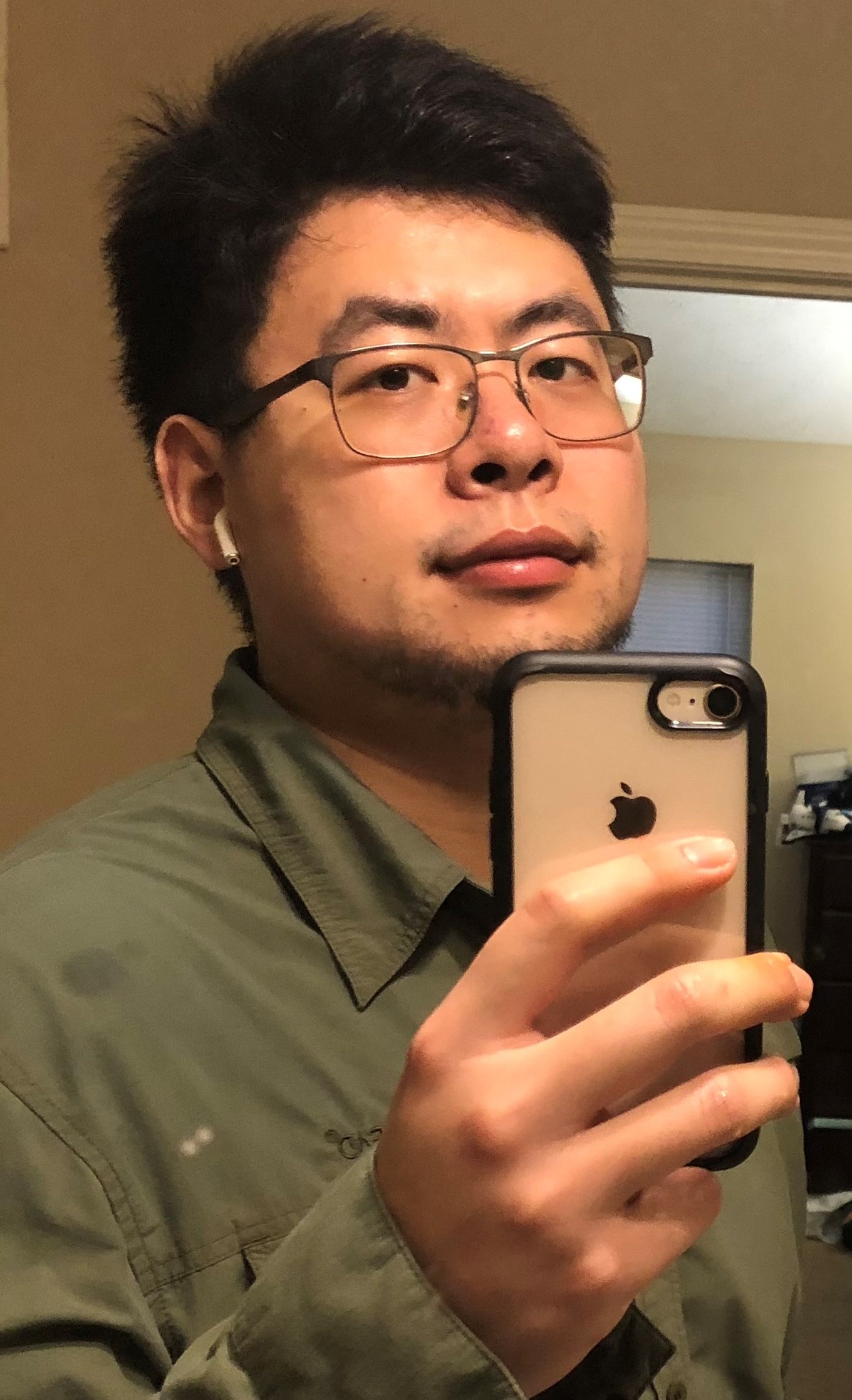 Siqi Wang takes a selfie from home with his iPhone. Wang hopes his contributions to GPR technology will make the tool as intuitive as Apple&rsquo;s iPhone.