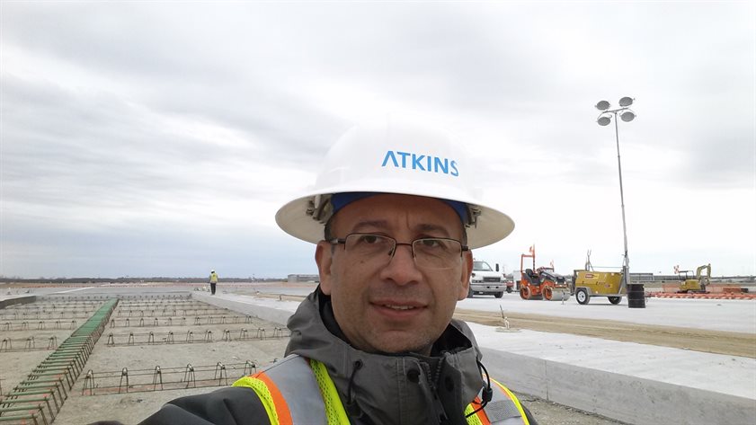 UIUC alumnus Manuel Bejarno, who currently serves as Atkins&rsquo; senior engineer, works on runway intersection replacement at the Tulsa International Airport.