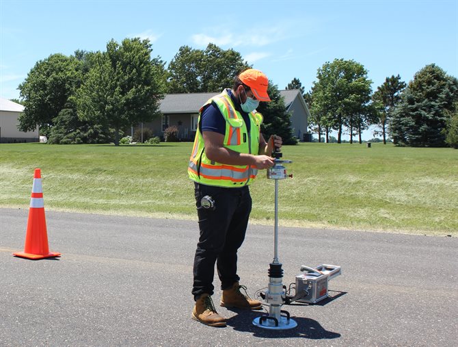 [cr][lf]&lt;p&gt;Javier Garc&iacute;a Mainieri, a CEE doctoral student, uses an asphalt lightweight deflectometer to measure pavement modulus on site during a cold-in-place recycling project near Farmington, Ill. on June 17.&lt;/p&gt;[cr][lf]