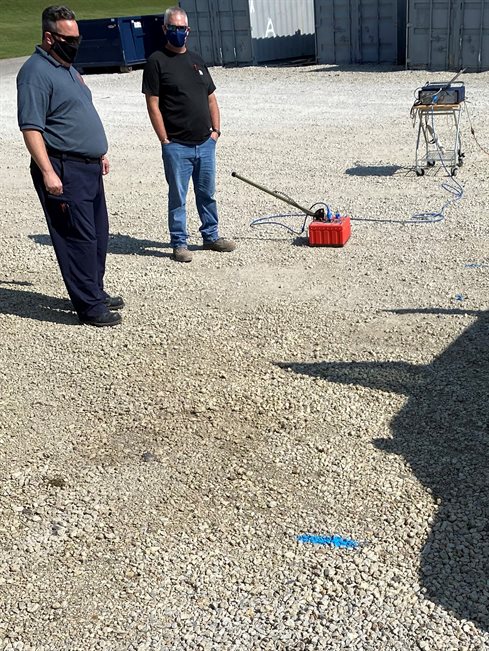 Allen Cameron, left, IFSI&rsquo;s facility operations specialist, and Greg Renshaw, ICT&rsquo;s senior research engineer, chat about using ground-penetrating radar technology to locate a water main at IFSI on Sept. 24. The location will soon be home to a new tower rescue prop for firefighter training.