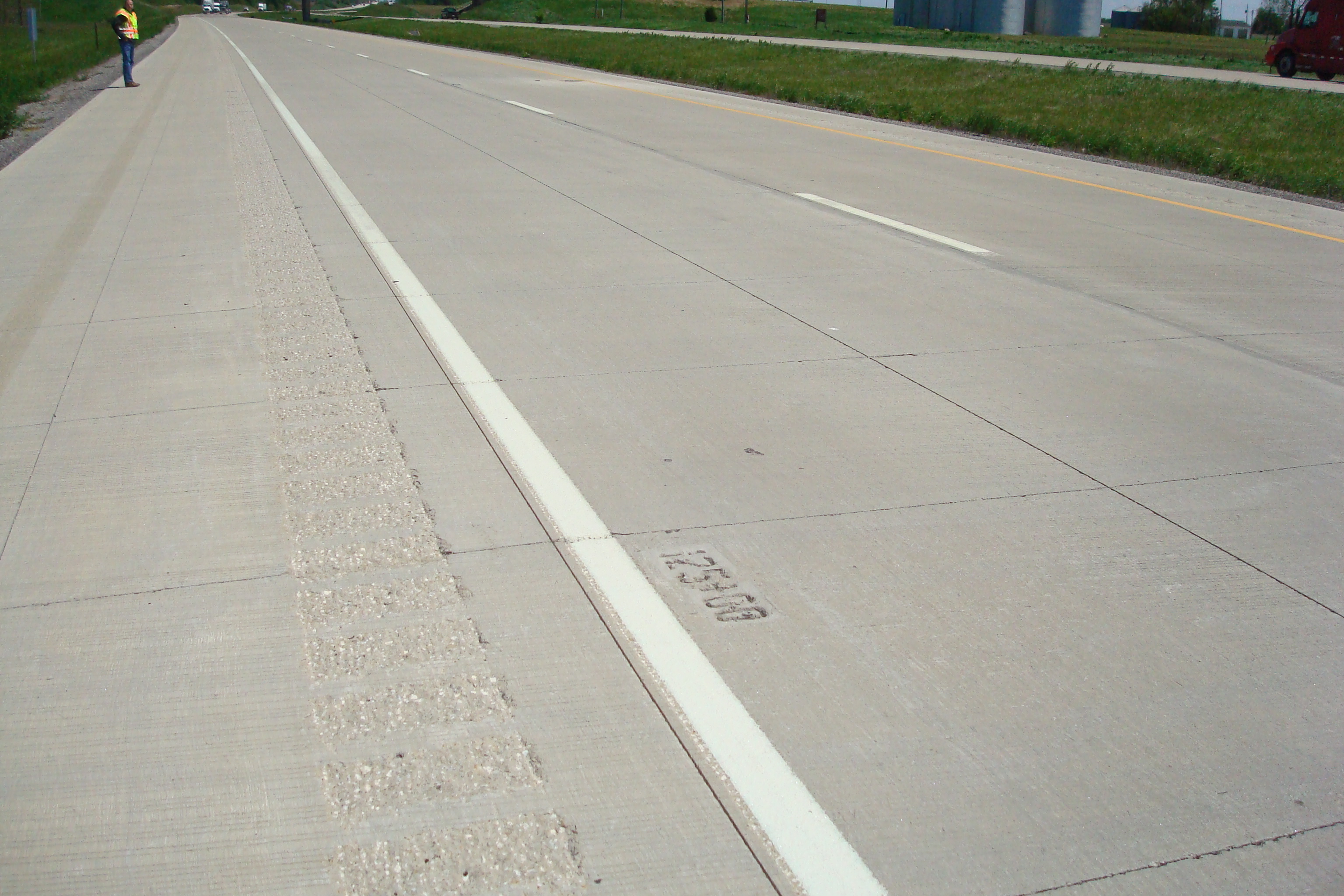 An experimental unbonded concrete overlay on I-72 east of Springfield, IL. The six-inch-thick overlay included synthetic macrofibers in the concrete mixture and was sawed into six feet by six feet panels in the travel lanes.