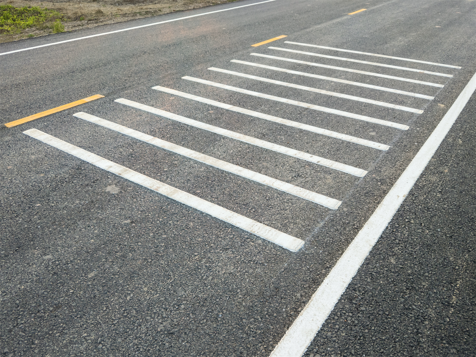 Center line, shoulder and transverse (shown above) rumble strips are patches within a roadway that warn drivers when to slow down or when they are leaving their lane. Rumble strips are a proven safety countermeasure to reduce crashes and alert drivers of changing roadway conditions.