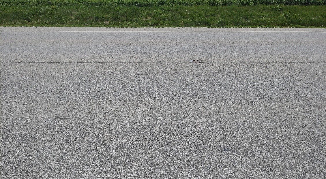 Asphalt binder is an adhesive that holds aggregates, such as gravel or crushed stone, in pavement together. As asphalt binder ages, it becomes more prone to cracking, affecting the life span of the pavement.