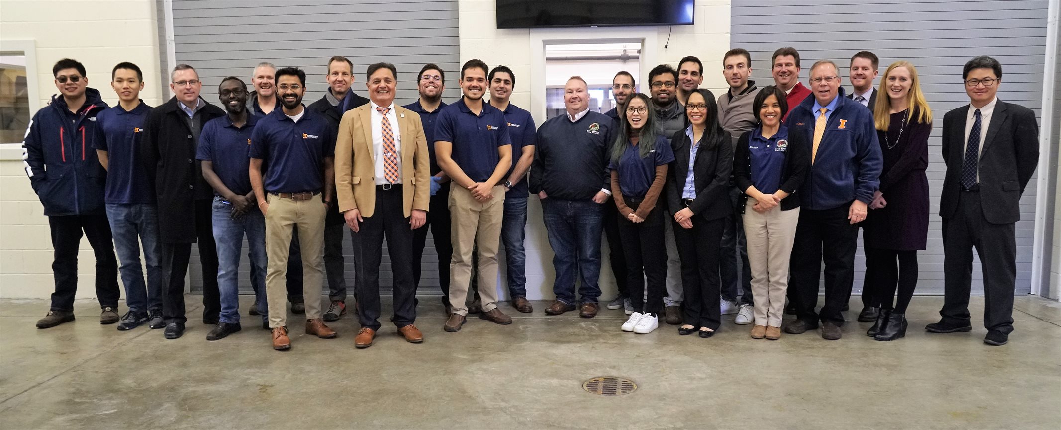 Illinois Center for Transportation&rsquo;s students, faculty and staff pose with Illinois Senator Scott Bennett during a visit to the&nbsp;Rantoul, Illinois, facility on Dec. 20, 2019.