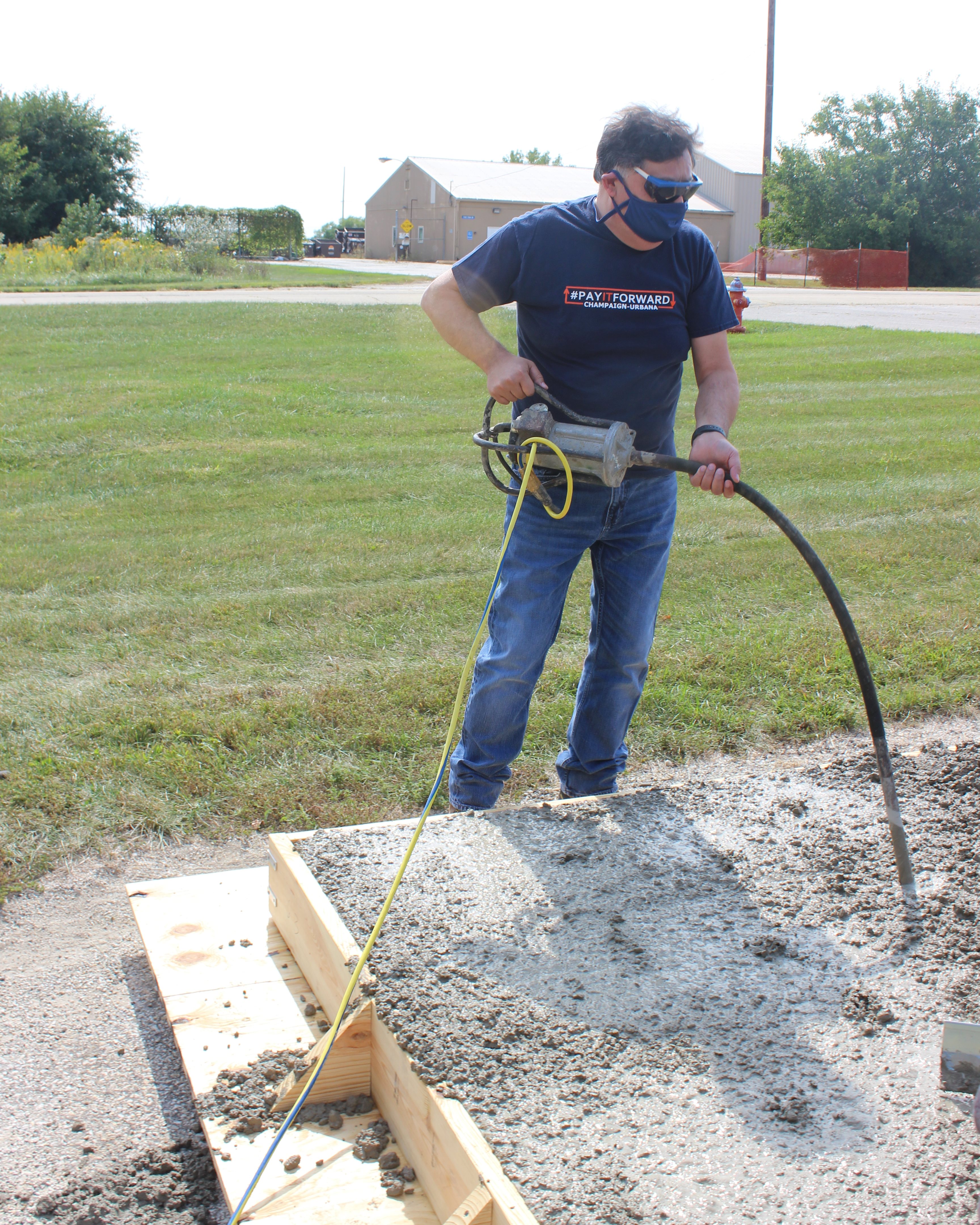 Imad Al-Qadi, ICT director and UIUC Grainger Distinguished Chair in Engineering, works at the Illinois Center for Transportation on September 22, 2020. Here Al-Qadi and ICT grad students prep concrete test slabs to research optimum lift configurations for hot-mix asphalt.