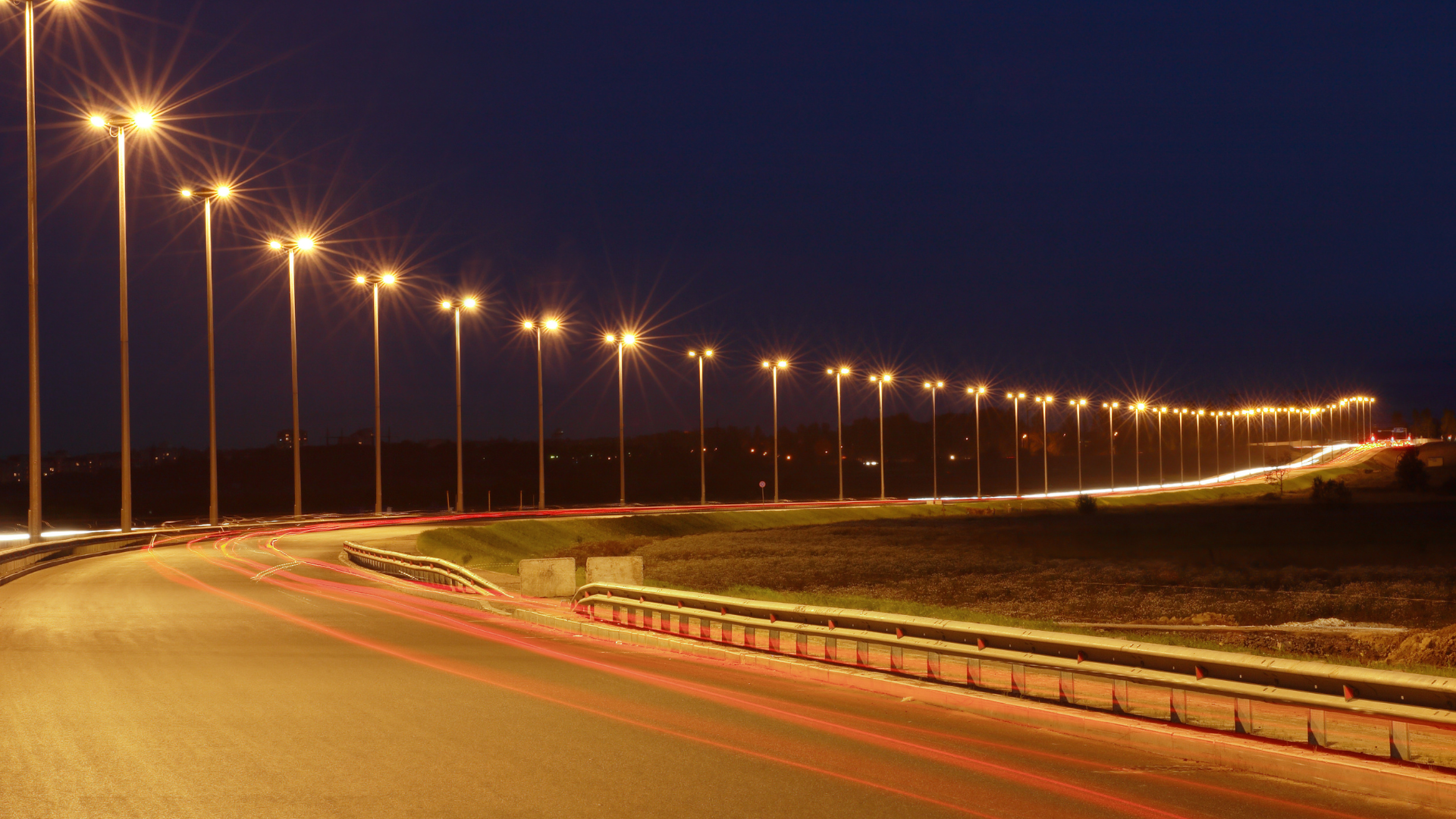 High-mast lighting is mounted at heights greater than 65 feet and are used to light large areas such as parking lots, highways and interchanges.