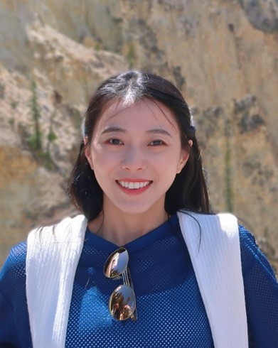 Zhou&amp;lt;span style=&amp;quot;background-color: var(--engr-white);&amp;quot;&amp;gt; smiles while on a trip during her graduate studies.&amp;lt;/span&amp;gt;