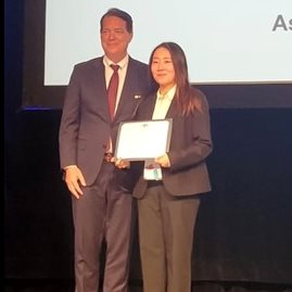 Han Wang, right, poses with International&nbsp;Geosynthetics Society president Sam Allen at the ceremony for the IGS student award during the GeoAmericas 2024 conference.