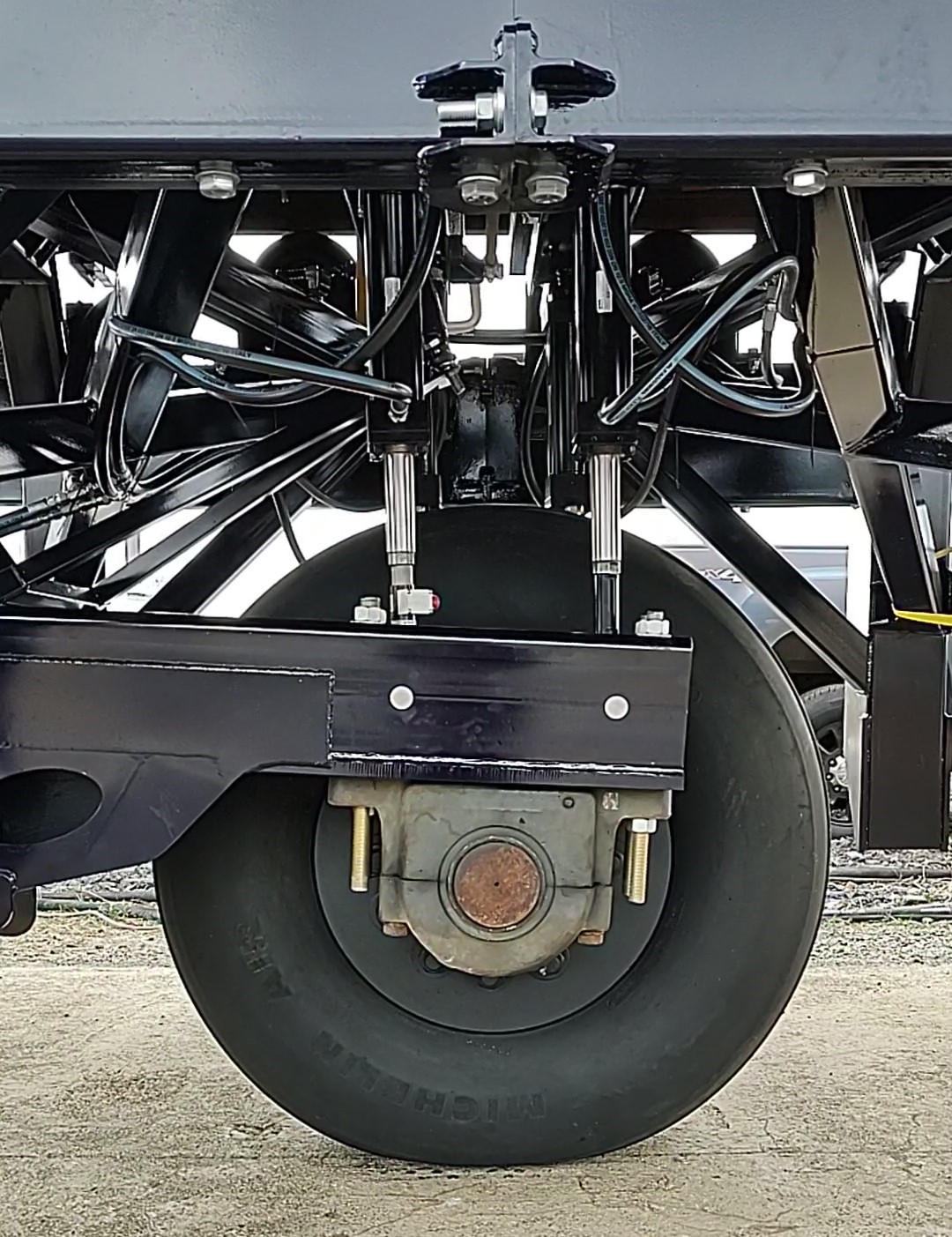 The enhanced load carriage with&amp;amp;nbsp;an aircraft tire assembly underneath the accelerated pavement testing system.