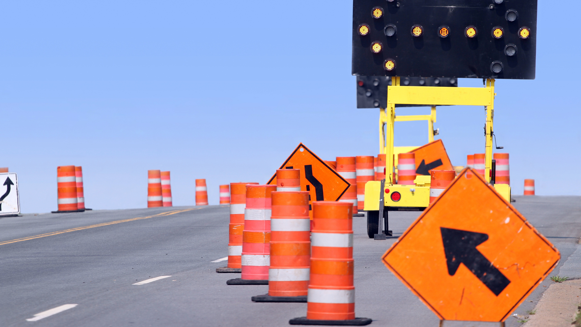 Traffic control devices use visual indicators to guide and inform drivers. Traffic control devices may be permanent, such as traffic signals or pedestrian crossing beacons, or temporary, such as traffic drums or barricades.