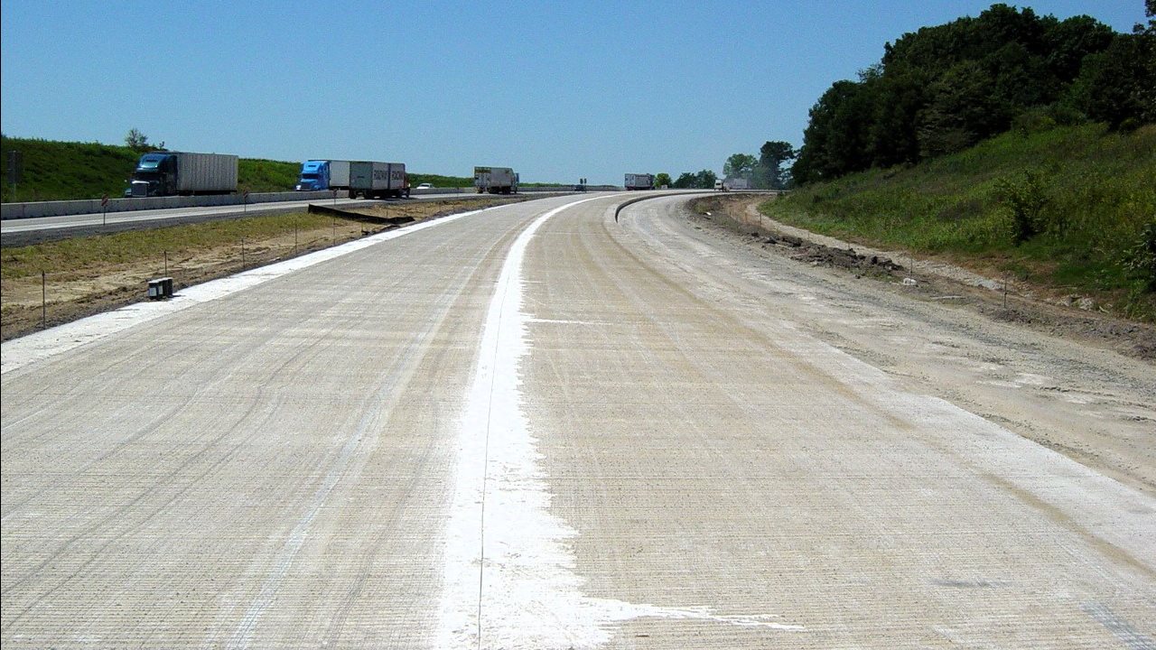 Provided by Charles&nbsp;Wienrank. A newly constructed continuously reinforced concrete pavement section prior to shoulder placement.